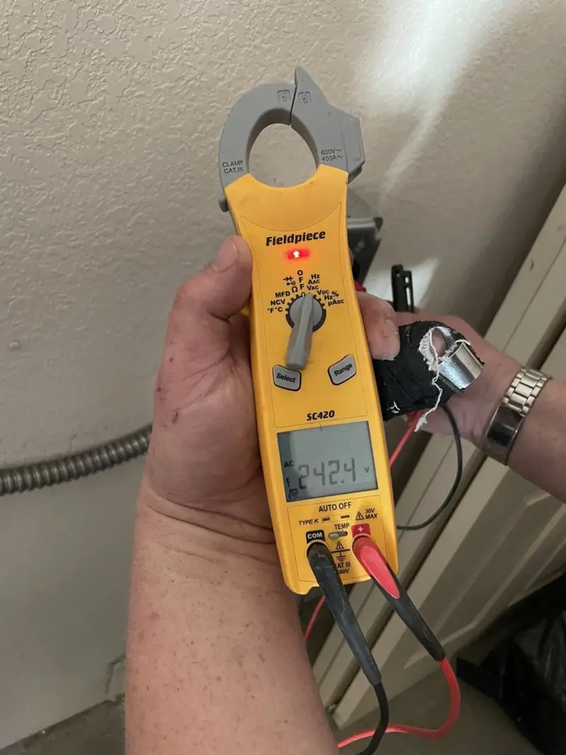 Voltage testing with clamp meter during Ceiling Fan Installation in Shrewsbury